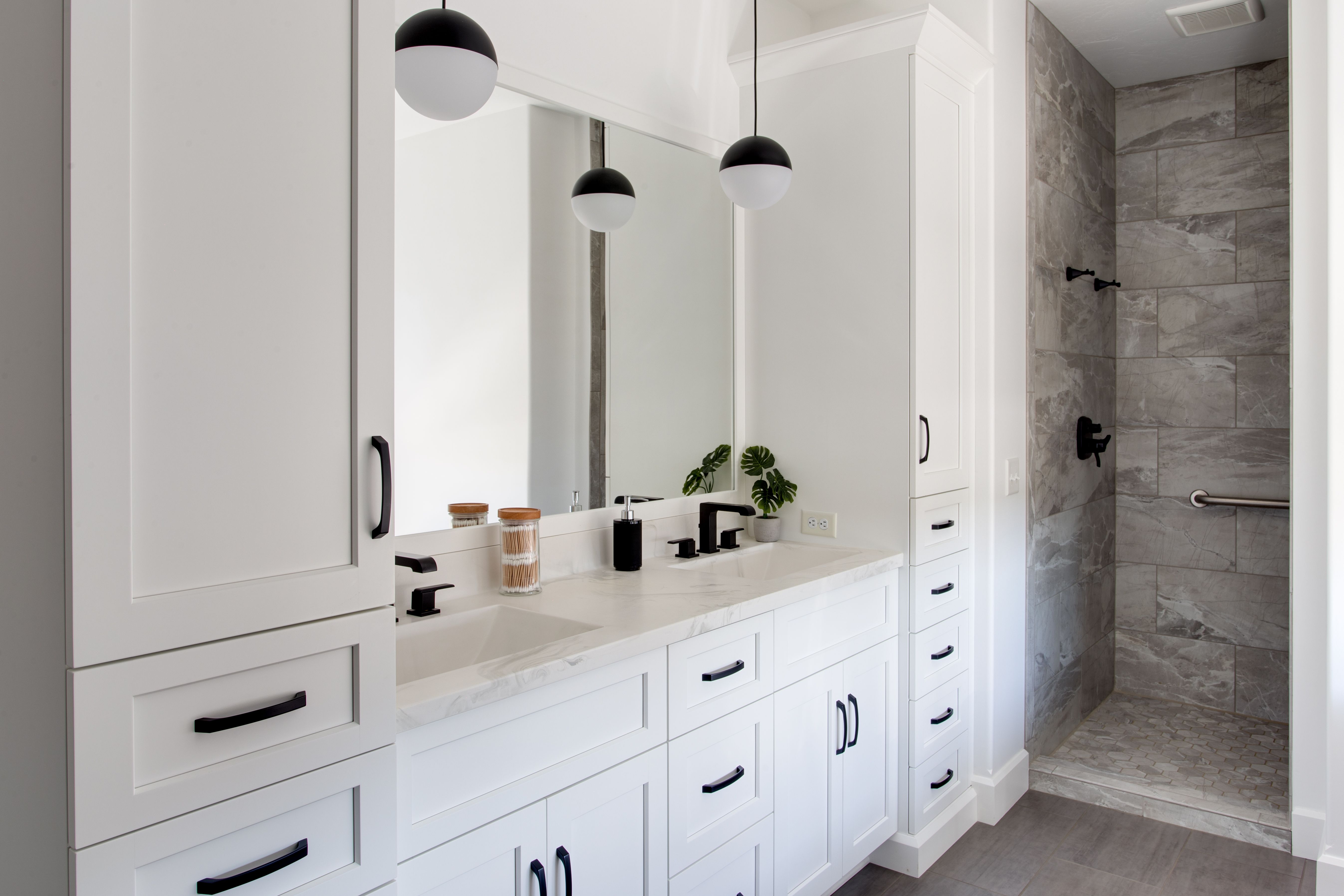 Modern bathroom with jacuzzi and lighted mirror