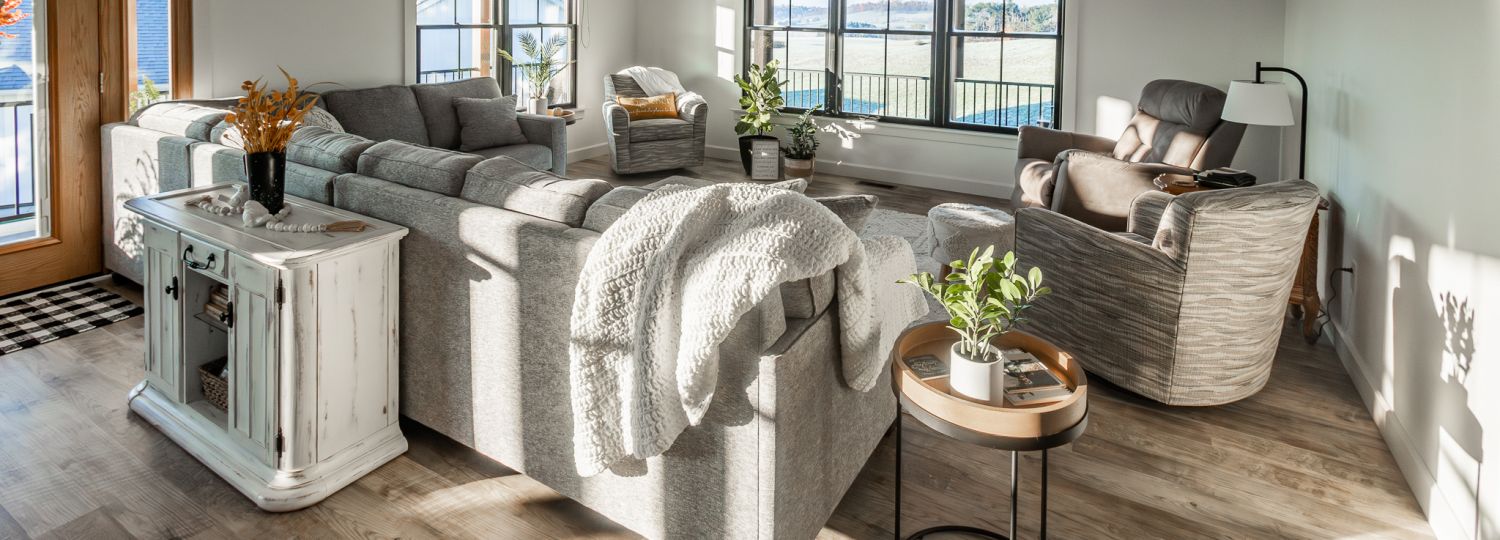 A tidy sunlit room in a newly built home