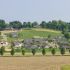 Hillside view of custom built homes in the country